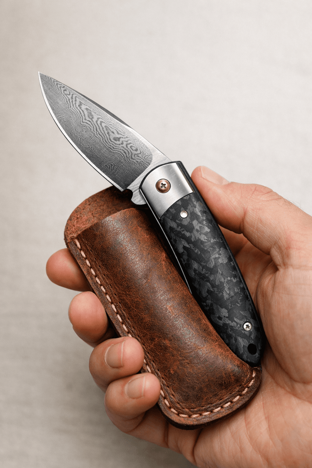 Premium folding knife held in hand